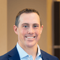 Headshot of Adam Driscoll