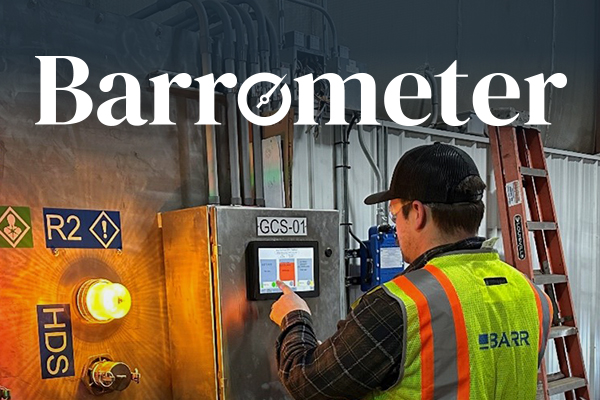 Cover image for EPC for Electrical Projects issue of Barrometer: At an industrial facility, a Barr mechanical engineer tests the human-machine interface and system functionality during startup and commissioning.