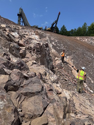 The Copper Peak ski jump superstructure and landing hill on a forested hillside near Ironwood, Michigan.