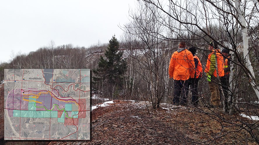 Project team surveying the inactive mine site.