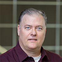 Headshot of Greg Wilson