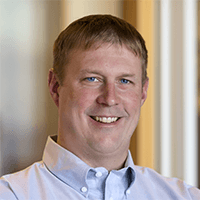 Headshot of Travis Davidsavor