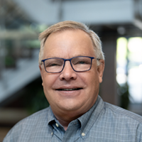 Headshot of Tom Ghidossi