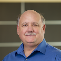 Headshot of Tom Kuchinski